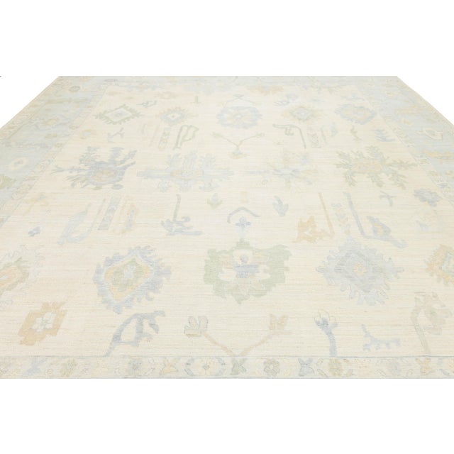 Ivory Artisanal Oushak Style Wool Area Rug: Neutral Ivory With Muted Floral Motifs For Sale - Image 8 of 11