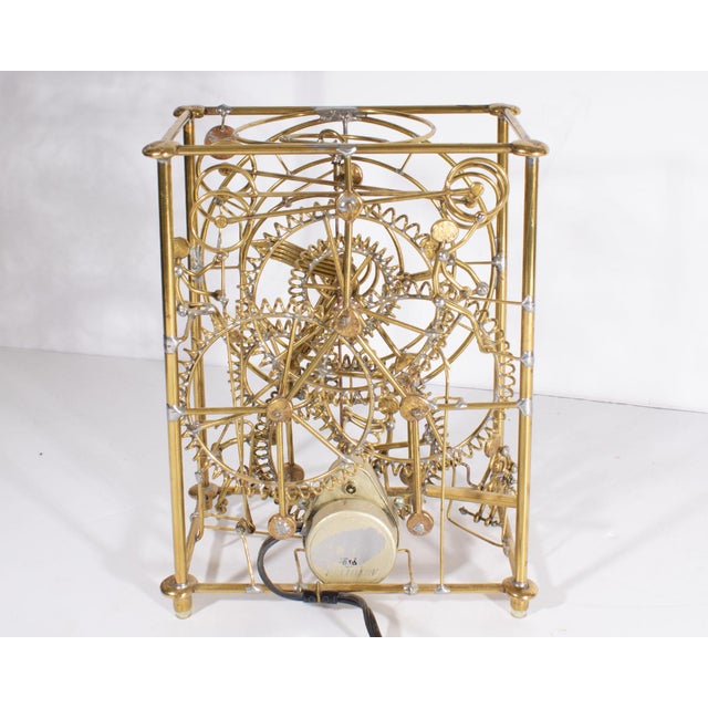 Studios SixMan Clock by Gordon Bradt Chairish