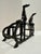 Antique black metal dog figural letter holder or desk organizer. Features two seated dog figures above an openwork divided...