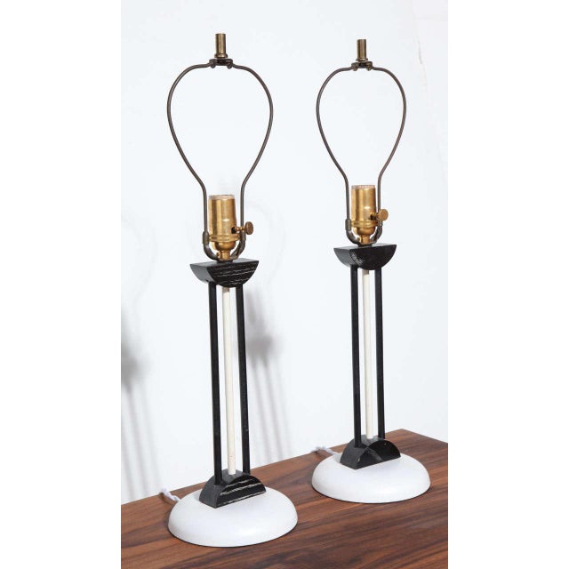 Pair of 1940's Russel Wright style White Enameled Metal and Black Lacquered Wood Bedside Lamps, Desk Lamps. Featuring...