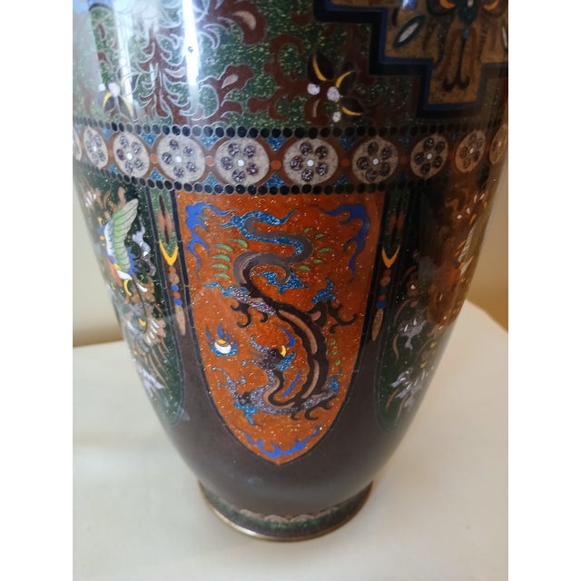 Stunningly beautiful antique decorative vase created in the imperial Japan. It was carefully crafted in solid bronze with...