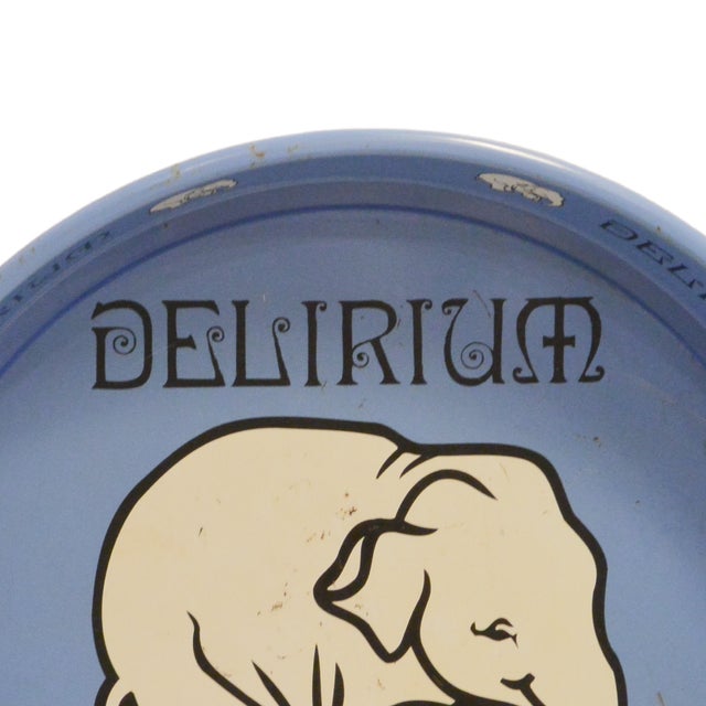 This vintage blue Delirium elephant beer tray is quite a unique find. It was created by the Huygle Brewery in Brussels,...