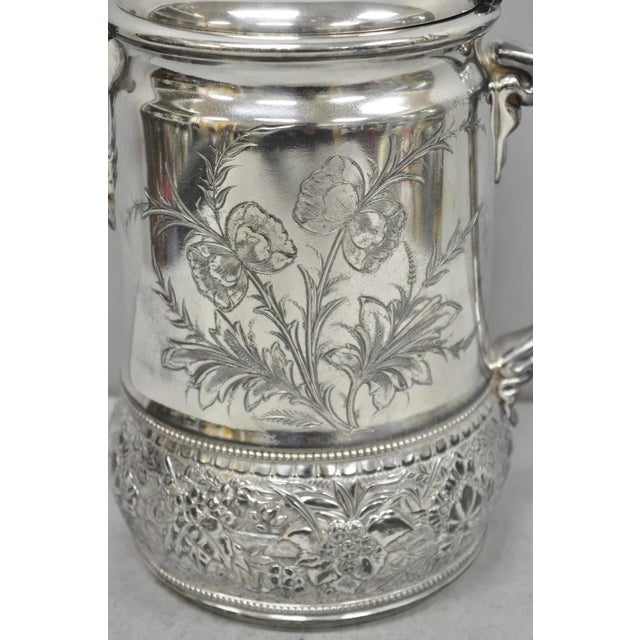 Antique Wilcox Silver Plate Co Art Nouveau Silver Plated Duck Handle Coffee Pot Pitcher with Floral Engravings Throughout....