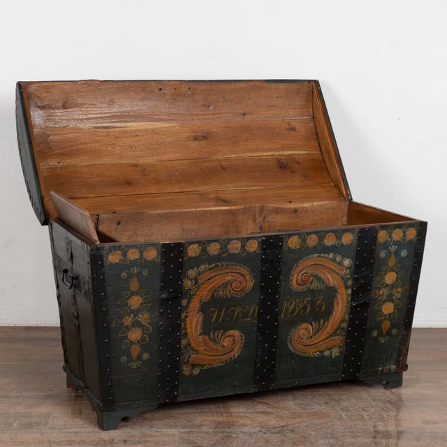 Original dark green painted dome top oak trunk from Sweden with black wrought iron straps and side handles. Monogram and...