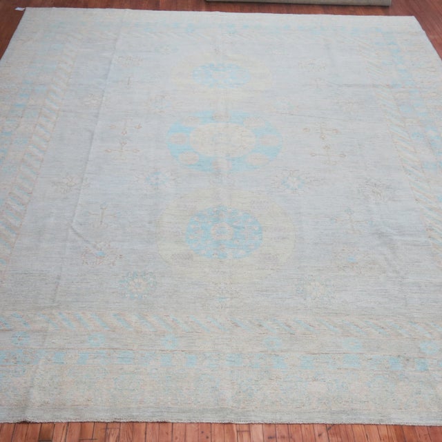 A Late 20th Century hand-knotted 100 % Vegetable Dyed Oversize pale color east turkestan Khotan Rug. This rug hasn't been...