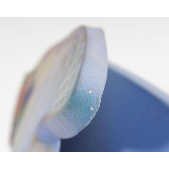 A Postmodern studio pottery vessel titled Calm Seas by the American artist Madeline Kaczmarczyk. This vessel has a coastal...