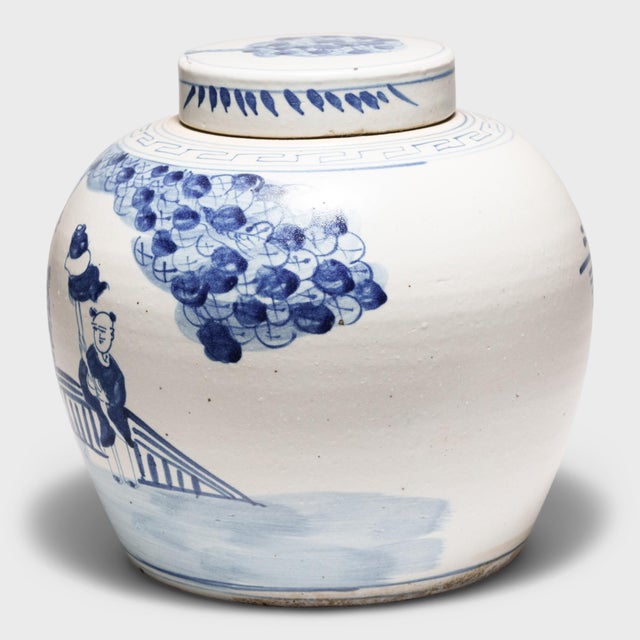Loosely brushed with cobalt blue pigments, this round, blue-and-white storage jar is underglazed with a celebratory...