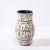 This Mid-Century Modernist Ceramic Vase W/ Coiled Motif is a beautiful example of Post War European Ceramics, realized in...
