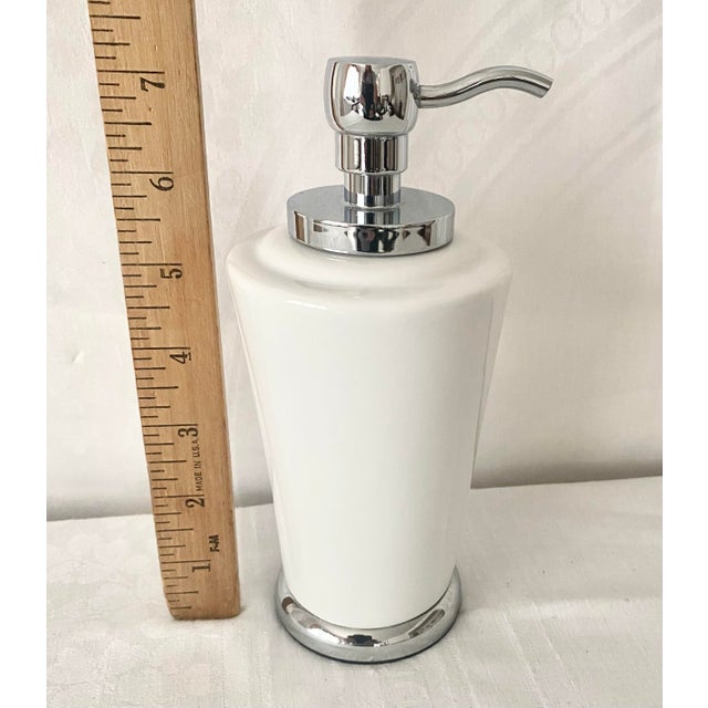 Vintage elegant liquid soap dispenser from Restoration Hardware's Lido classic bath collection. It features a tapered,...
