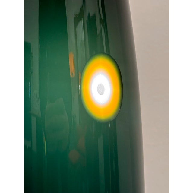 The Oci table lamp, designed by Rodolfo Dordoni for Flos in the 1990s, is made by Venini from blown and layered glass with...