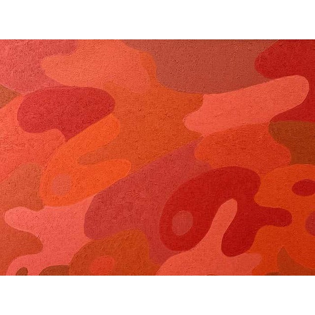 A vivid counterpart to the blue composition, this painting immerses the viewer in a field of interlocking crimson,...