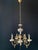 The italian chandelier is made of brass. Impeccable artistic forging. The chandelier is adorned with floral-style...