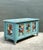 This charming vintage blanket trunk is a vibrant celebration of European folk art traditions, featuring exquisite hand-...