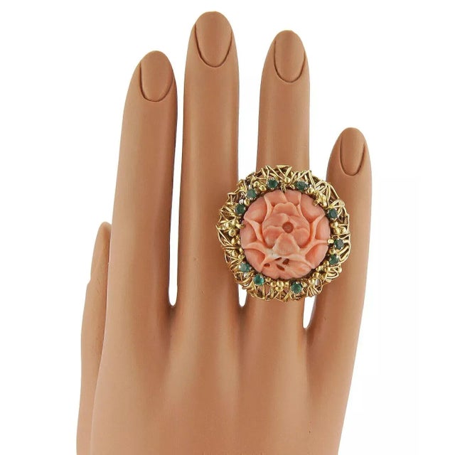 This beautiful J. Auen designer ring is finely crafted from 14k yellow gold. It features a beautifully carved piece of...