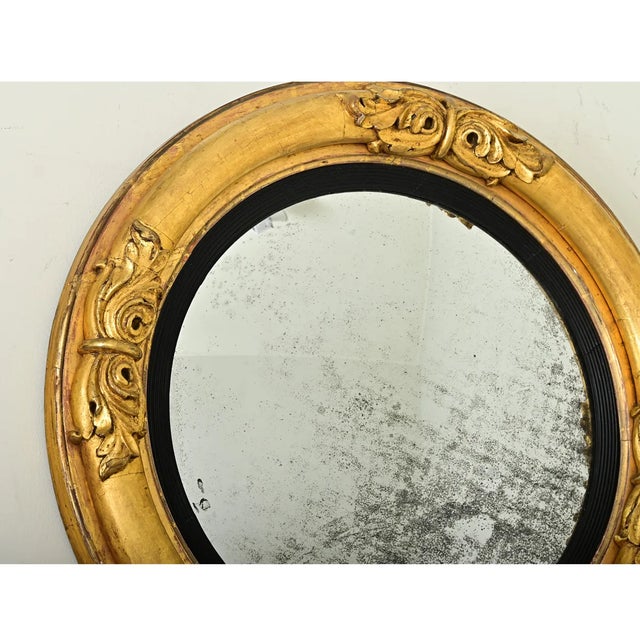 Dimensions: 30 ½” H x 30 ½” W x 4 ⅛” D This large English 19th century convex mirror exudes timeless elegance and style...