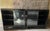 Pair of Mid-Century Glass Front Display Cabinets - Black Gloss finish 34" w x 20" d x 33" h Both glass doors slide in two...