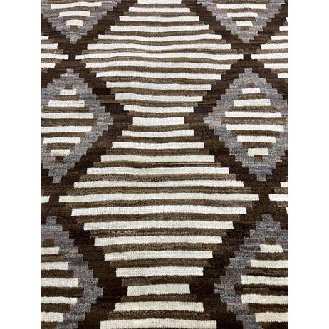 Hand knotted with top quality natural dyed wool and cotton . This unique and innovative Navajo Rug is an eye catching...