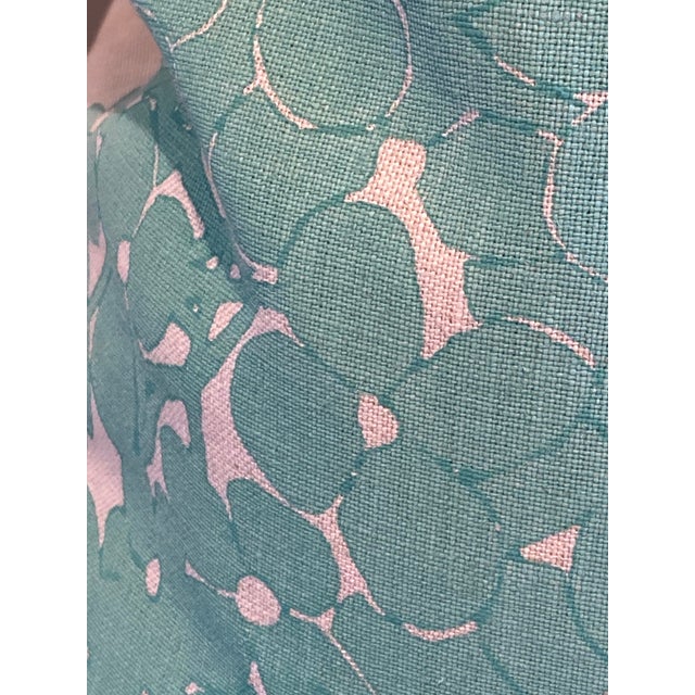 Elevate your living space with this stylish accent pillow, featuring a vibrant teal floral cluster that brings a...