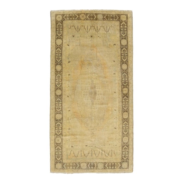 Beige Antique Turkish Khotan Wool Rug Handmade With Center Motif For Sale
