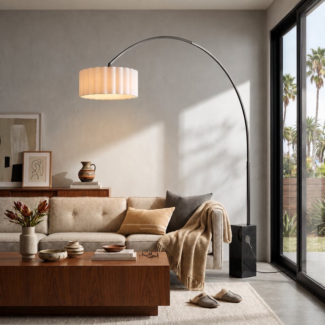 A BLACK ARC FLOOR LAMP THAT LIGHTS YOUR SOFA FROM ABOVE. NO CEILING WIRING NEEDED. This mid century modern arc floor lamp...