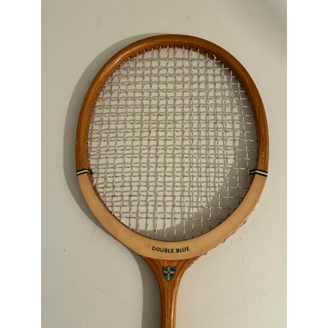 Vintage wooden squash racket. Made in England. From the 1970s.