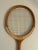 Vintage wooden squash racket. Made in England. From the 1970s.
