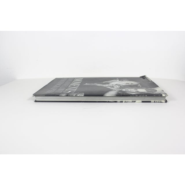 Moments Roxanne Lowit Photographs 1993 The book is in good vintage condition with slight yellowing at the edges of the...