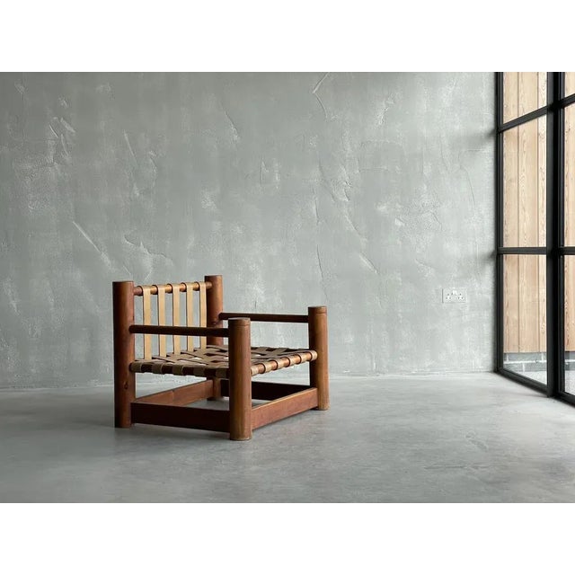 A rare 1960s Spanish Pine and Leather strap work Chair, attributed to Miguel Fisac. Miguel Fisac (1913-2006) was an...