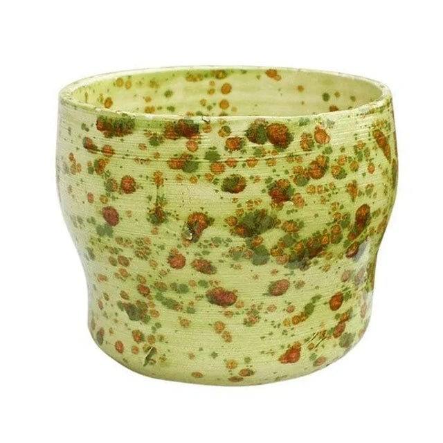 An unusual drip-painted studio pottery bowl or planter. Created from clay in a studio in the 1970s in Oklahoma, this piece...