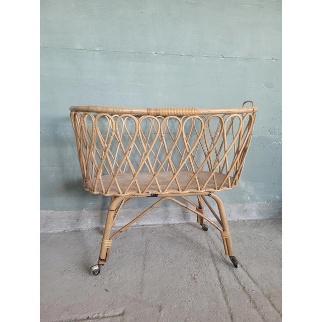 Antique bamboo cradle on wheels. Excellent overall condition. Period: Second half of the 20th century Dimensions: Length:...