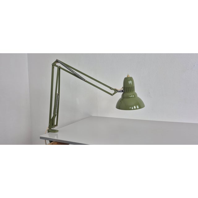 Angle-adjustable Swedish work lamp by Ledu from the 1960s. This piece has an attribution mark, I am sure that it is...