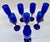 Set of eight sensational and sleek-looking cobalt blue champagne flutes. Gorgeous color and sure to make a statement for...