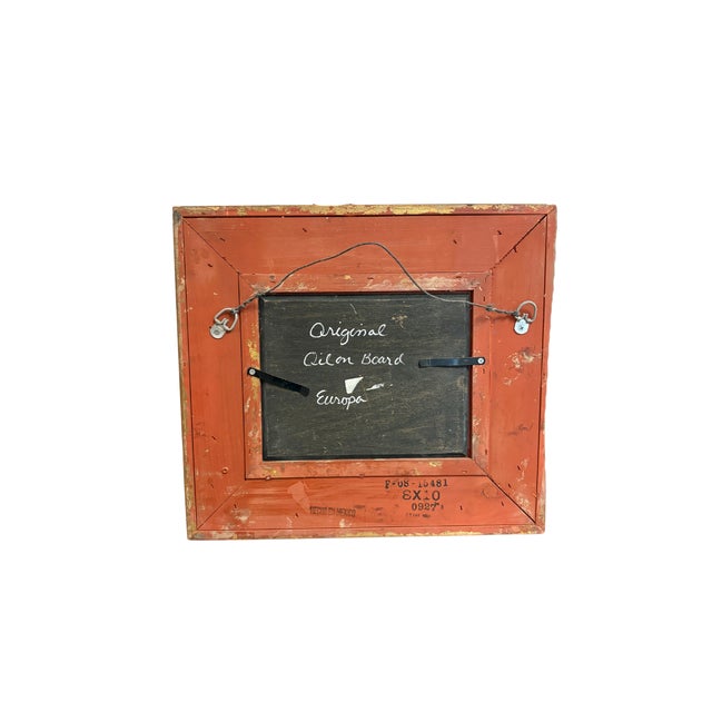 A richly detailed European-style still life painting, depicting a classic basket of fruit rendered in warm, atmospheric...