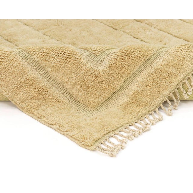 Luxurious hand-knotted wool rug with a flat-woven Jonquil Yellow Art-Deco inspired pattern, offering a sophisticated and...