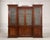 A grand Ralph Lauren Home “Noble Estate” two-piece bunching china cabinet or library bookcase in richly toned mahogany...
