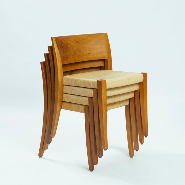Beautiful set of 4 walnut wooden dining chairs with woven papercord seats by Molteni & co, Italy, 1990s. This full wooden...