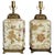 Offering a pair of vintage Chinese porcelain table lamps with flowers and leaves with gold detailing, circa Late 20th...