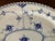 Iconic open work lace border along the entire rim; hand painted cobalt floral pattern;