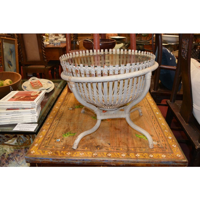 This small table is in good condition overall. Franco Albini style, unmarked. Gray weathered bamboo & rattan. The...