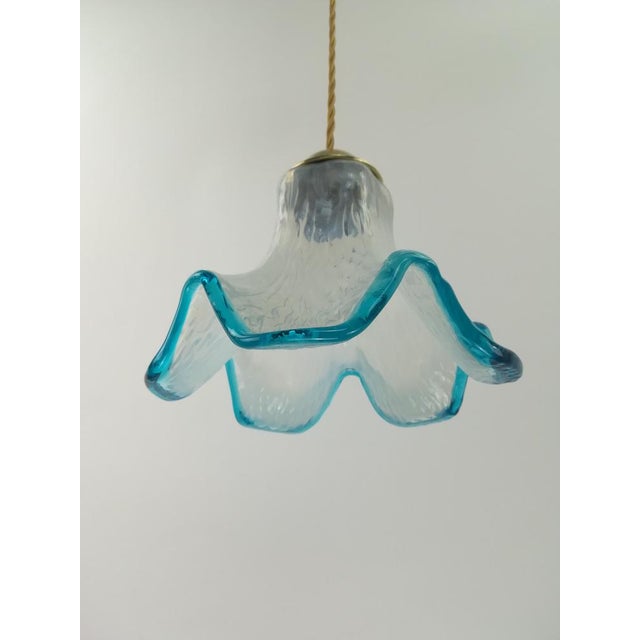 Opal glass shade: Mouth-blown overfitting glass 50s design Ø 20 cm Height: 14 cm Lampshade holder: Material: brass Height:...