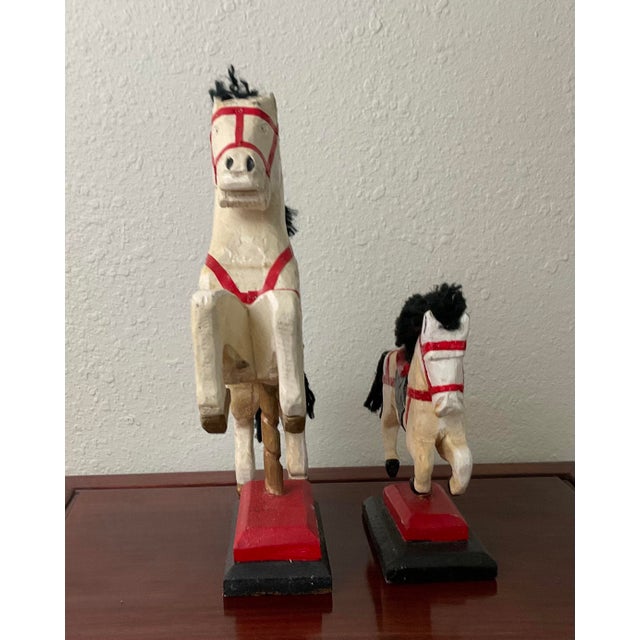 Pair of hand-carved decor for child or horse-lover. Would make a great gift for the Equine or Circus lover. The artist is...