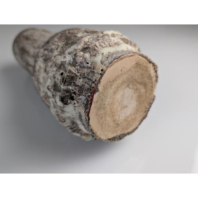 German ceramic vase, representative of the Fat Lava style, is an outstanding example of mid-century modern design from the...