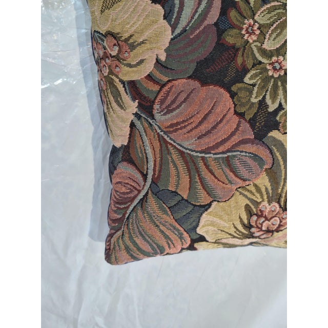 Vintage -style lumber pillow. One side features a beautifully woven floral Tapestry in earthy tones of olive, rust gold...
