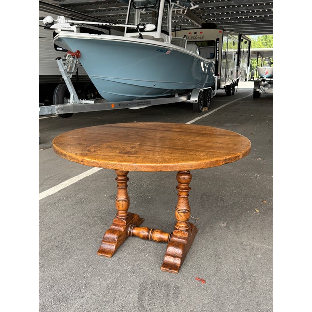 This 19th-century French Louis XIII walnut table exudes timeless elegance, crafted with intricate detailing and decorative...