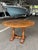 This 19th-century French Louis XIII walnut table exudes timeless elegance, crafted with intricate detailing and decorative...