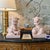 A impressive pair of vintage ceramic guardian lions (foo dogs) finished in a glossy, monochrome pale blush pink glaze....