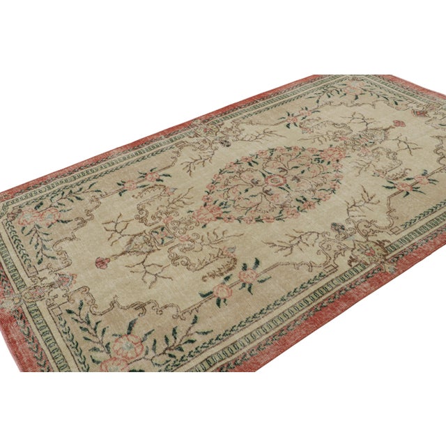 Hand Knotted in wool, this 5x8 vintage Zeki Múren rug originates from Turkey circa 1960-1970, and features a unique play...