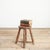 Rustic Wooden Milking Stool A charming antique stool made from solid pine originally used as a milking stool due to its...