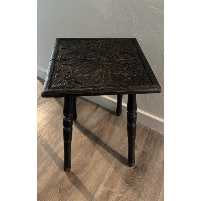 A delightful 19th century English oak table, full of quiet character and time-worn charm. The top is gently carved,...
