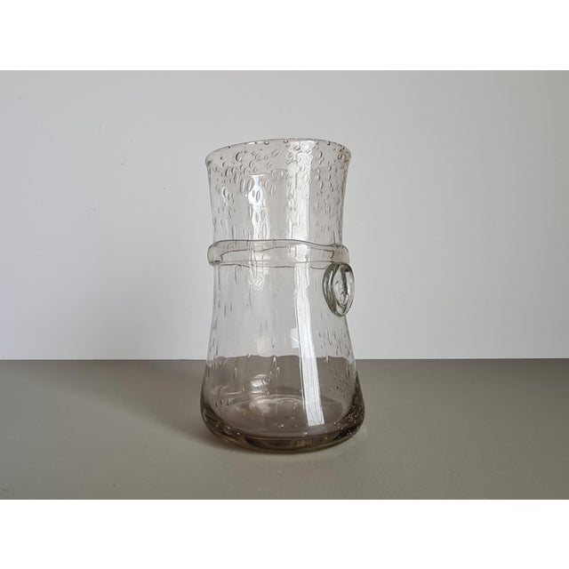 Vintage French hand-blown glass vase from Biot, dating from the 1960s–1970s. This iconic piece from the Biot glassworks on...